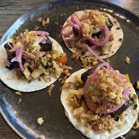 Jerk pork belly tostados  at Jam Delish in North London