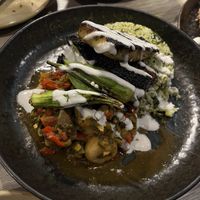 Callaloo and codfish - this was utterly delicious. The codfish was great and the spinach rice was so flavourful  at Jam Delish in North London