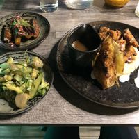 Fried ‘chicken’ with Jamacian gravy and seasonal greens and bbq jerk plantain fries  at Jam Delish in North London