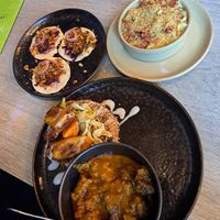 Curry, bacon mac,  and jerk tacos at Jam Delish in North London