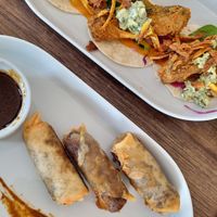 Spring onions and fish tacos (best tacos) at Jam Delish in North London