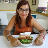 My EX-wife with her veg hot dog !  at Loving Hut in St Kanzian