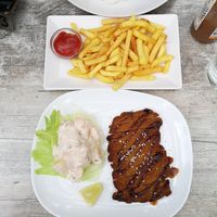 Wiener harmony with potaote salad and fries at Loving Hut in St Kanzian