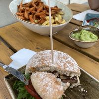 Pound of mixed fries, avocado cream and veg burger at Hans im Glück  in Karlsruhe