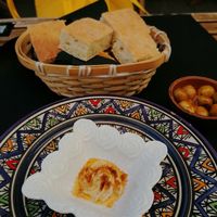 Courtesy hummus and spicy olives at Dükela in Pontevedra