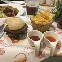 Burger with chips and dips at Began Vegan in Bangkok