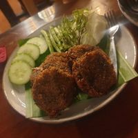 These were some Thai quinoa cake, they werent it, no dip?! And served with just quite hard raw veg like a fifth of a cabbage and lots of green beans 5/10 at Shann Cafe  in Chiang Rai