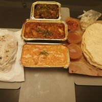 Sag aloo, veg bhuna, veg dansak, chapati and poppadoms at Lancers Restaurant in Doncaster