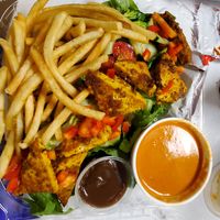 Spicey Tofu with green salad, fries and Masala sauce at Greenhaus Eatery in San Diego