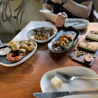  Patatas Bravas, Salmon special tapas, Prawn special tapas and Half cold cut platter at Chez Kessler in Barcelona