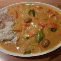 Main course - yellow curry with pumpkin and sweet potato  at Well Being in Cologne