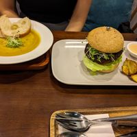 Right, black bean burger. Left, pumpkin soup (with bread as an optional extra) at Zeroism - Vegan Café & bakery in Ho Chi Minh City