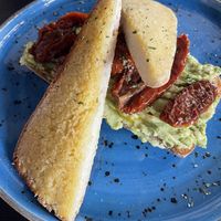 Avocado and sundries tomatoes on toast  at Bird & Bean in Frinton-on-sea
