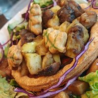 Fine tart, onion confit, mustard, golden apple and chestnut with rosemary, potato salad with maple syrup and smoked oil. at Café Contresort in Paris