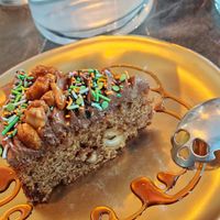caramelized peanut cake with creamy peanut-cocoa sauce at Café Contresort in Paris