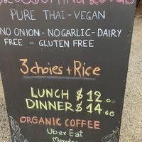 Sign on footpath  at Blossoming Lotus in Surfers Paradise