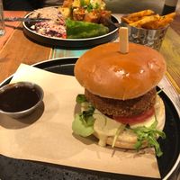 Pictured: Organic Jerk Tofu with rice and Vegan Motherclucker Burger with fries at Turtle Bay in Bournemouth