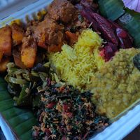 Weekend rice and curry plate with optional meatballs to-go at Mirisata in Portland