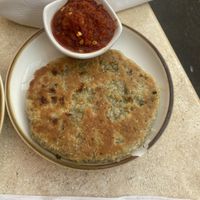 Hot chilli Pol Roti! She thicccccc and spicy just like I like it!!!  at Mirisata in Portland