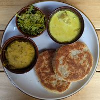Pol Roti Combo Plate with dhal, broccoli mallum, and potato curry at Mirisata in Portland
