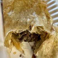 “Pork” curry in cashew cheese roti 🫓   at Mirisata in Portland