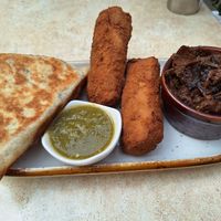 Vegetable roti, beef rolls, and wambattu (eggplant) at Mirisata in Portland
