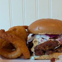 The Deviled Burger and onion rings at Mirisata in Portland