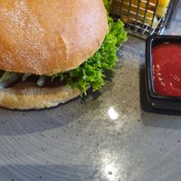 Vegan Green Mountain Burger with Chips at Aarmühle in Interlaken
