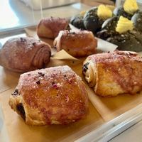 GF/V Pain Au Chocolat with rose glaze, Black tahini chip cookie  at Ordinarie Fare in Dayton