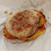 Bacon, egg, cheese, and hash brown sandwich at Sojo's Donuts in Mesa