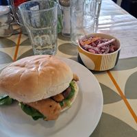 Vegan sausage (not meat copy) with mushrooms and fresh spinach. Side helping of vegan slaw. at Duckies Cafe in Hayle