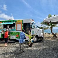The drinks are in a self-serve refrigerator to the right.   at PlantTastic in St Thomas