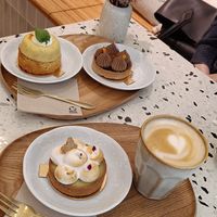 Pineapple Mint (back, left); Choco Caramel (back, right); Lemon Meringue (front); Oat latte at Michel MaBelle in Bordeaux