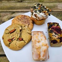 Clockwise from the top:
Carrot cake, Financier Framboise, Financier Citron, Cookie choco pekan, and Cookie choco noistette. at Michel MaBelle in Bordeaux