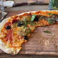 Tasty pizza with vegan cheese - after I’d got stuck in I was too hungry to wait! at Wildwood in Plymouth