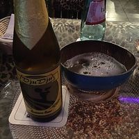 beer in coconut bowl (green = no flavor) at Kilimanjaro in Frankfurt