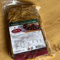 Gluten desmechado at El Manjar Industria Vegana in Bogota