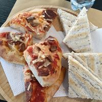 Salami pizza and mortadella toastie at efrem in Turin