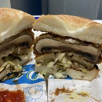 Sesame bagel, Katsu portobello, pineapple, cabbage, tartar sauce  at 404Plant in Hong Kong Island