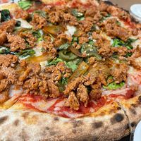 “Vegan get feisty” pizza so good! Just the right amount of heat! at Corvo Bianco Wood Fired Cookery in Dunedin