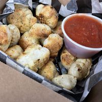 Vegan garlic bites. They also have vegan ranch!  at Corvo Bianco Wood Fired Cookery in Dunedin