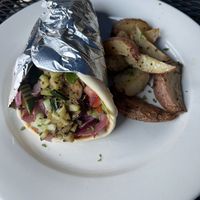 Veggie Hummus Pita with Roasted Potatoes side  at Jake and Telly's Greek Taverna in Colorado Springs