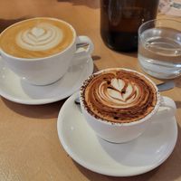 Flat white and cappuccino  at Plant Vibes Cafe in Bowen Hills