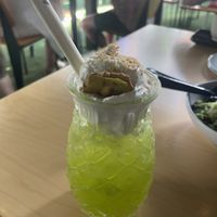 Cocktail with coconut creamm  at George's Beach Club in Raglan