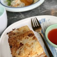 Radish cakes (with wontons in the background )  at Green Sprouts Vegetarian in Neutral Bay