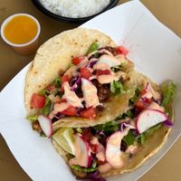  at Muñecas Downtown Taco Garden in Gainesville