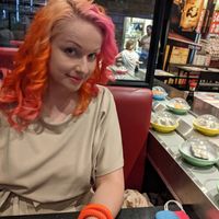 Dishes going round on the sushi belt at Sakushi in Sheffield