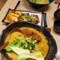 the ground 'meat' ramen and in the background, the egg ramen at Vegan AF Ramen in Krakow