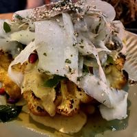 BBQ cauliflower shawarma with labneh mornay, green papaya, and curry leaf oil. Super delicious and the pomegranate seeds topped off the combined flavours perfectly   at ZA ZA TA in Fortitude Valley