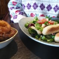 The onion rings (vegan) and my wife's salad (garlic bread not vegan, but veggie) at The Crown Inn in Isle Of Lewis